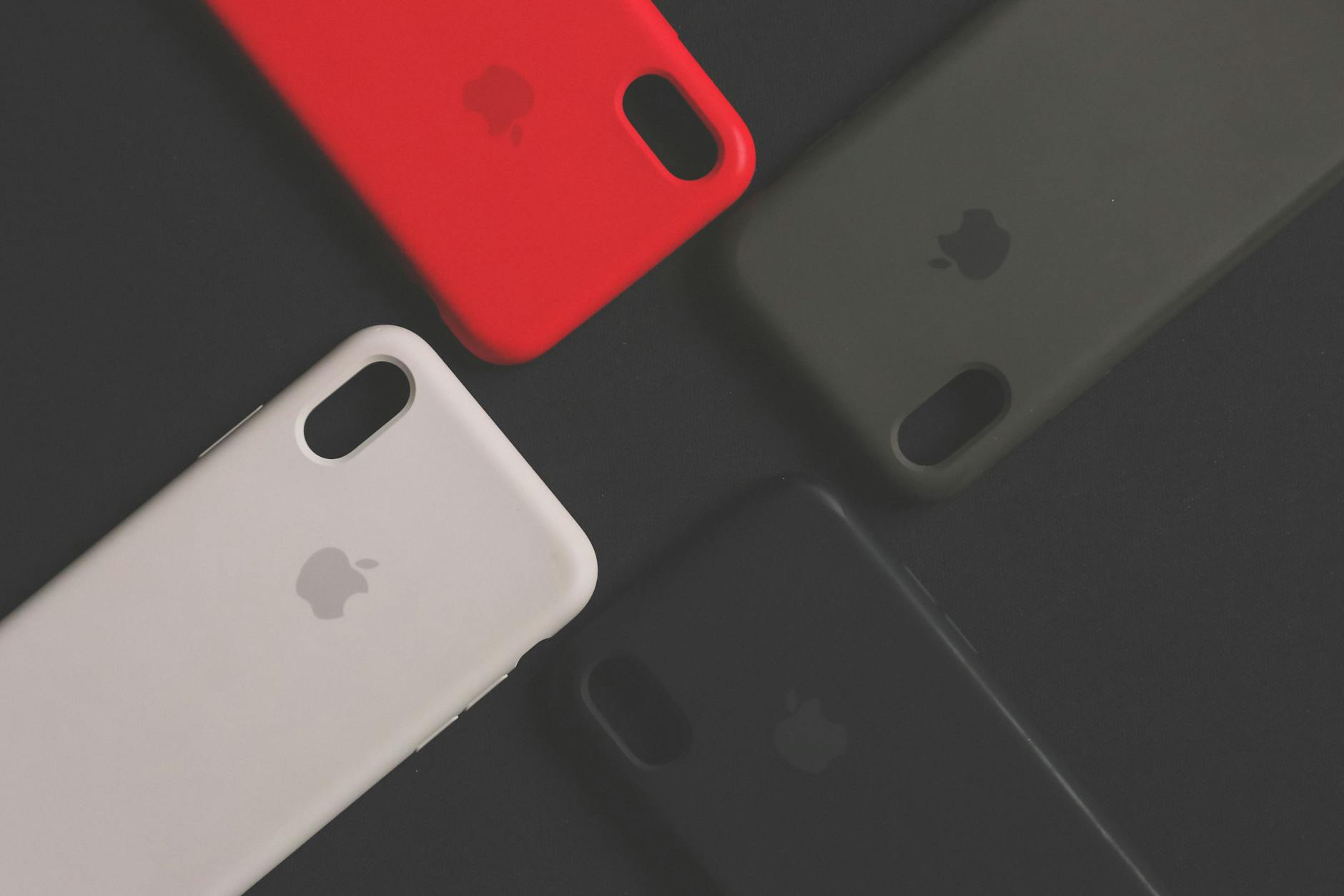 four assorted iphone cases